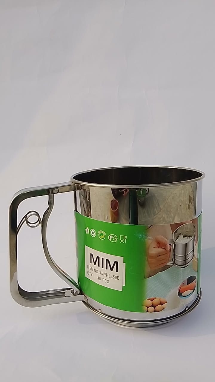 Metal mug with green label featuring the brand 'MIM' on a white background