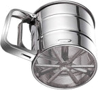 Metal flour sifter on a white background