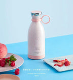 Pink and white insulated bottle with fruit on a blue background