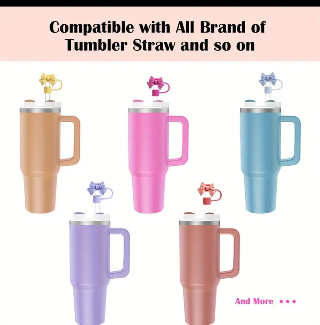 Set of colorful tumblers with handles on a white background