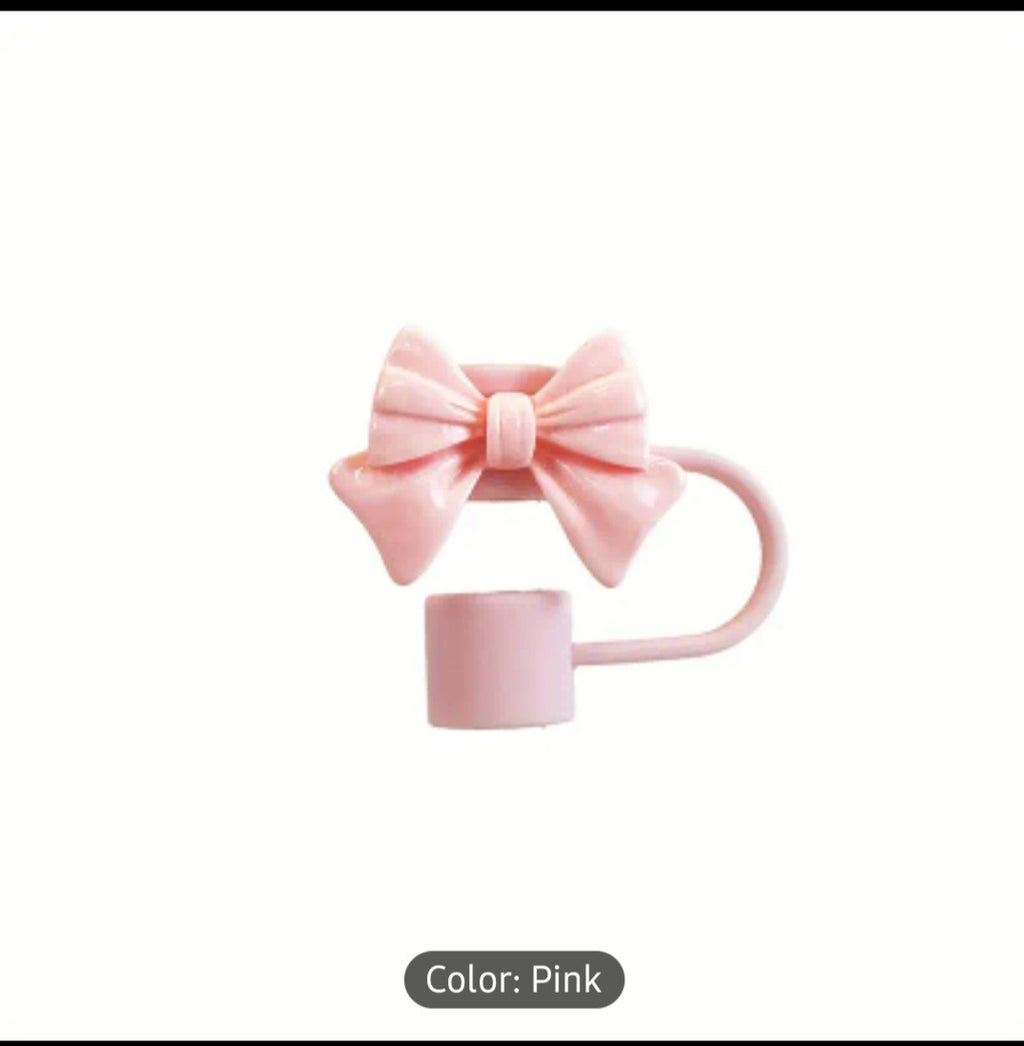 Pink mug with a bow on a white background
