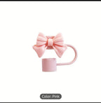 Pink mug with a bow on a white background