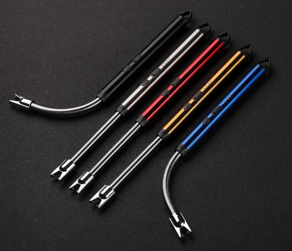 Set of five metal tools with flexible ends on a black background