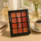 Mocallure powder kiss lipstick matte palette on a table with coffee, towel, and flowers.